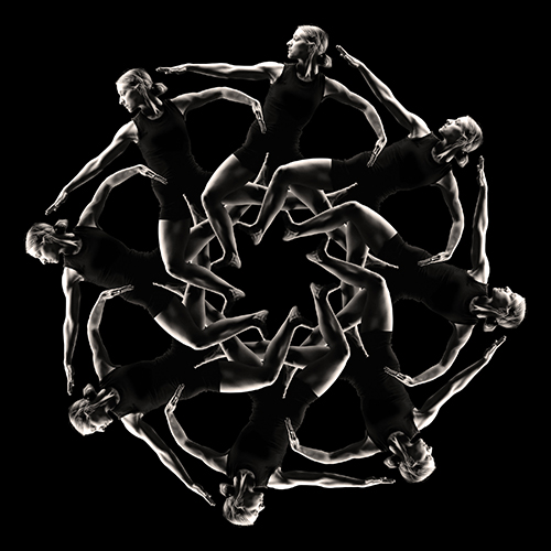 A black and white kaleidoscope-like image featuring multiple figures of a dancer in athletic wear, arranged in a circular pattern with limbs extended, creating a symmetrical design against a black background.